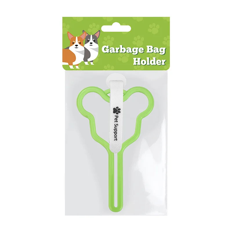 A clear plastic package containing a green garbage bag holder for a dog's poop bag.