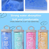 A collection of blue and pink pet skin towels and a storage bucket for dog bath towels.