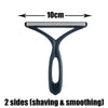 A black pet grooming brush with a flat shaving head and a curved handle for cats and dogs.