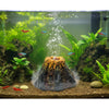 Aquarium volcano bubble stone decoration featuring mossy rock and small fish in clear water