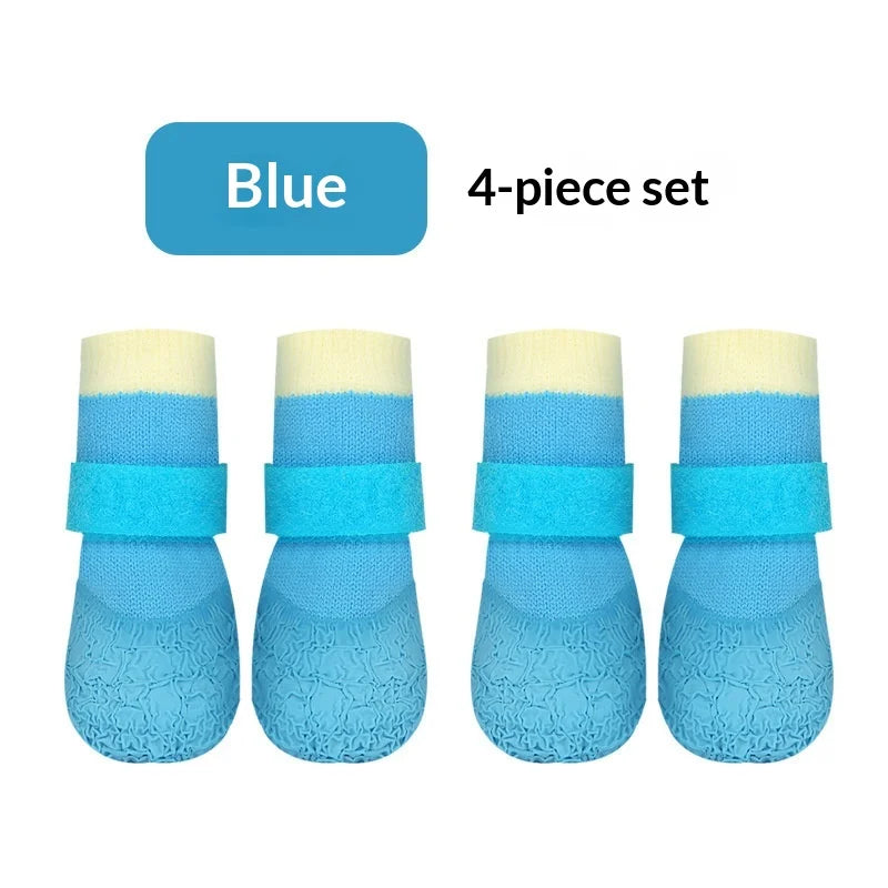 A set of four blue waterproof anti-slip dog boots for small breeds.