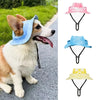 Un perro vistiendo un sombrero para mascotas ajustable de oreja de color azul claro