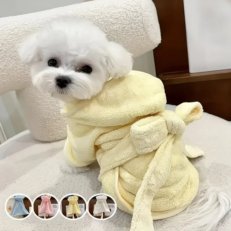 A fluffy yellow absorbent quick-dry pet bathrobe for dogs and cats is displayed on a white surface.