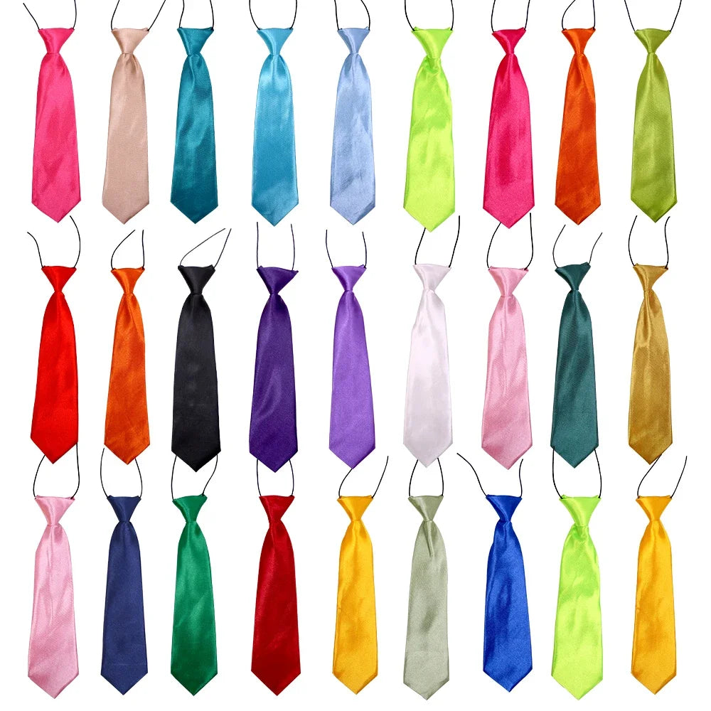 A collection of adjustable pet bow ties in various colors and fabrics for dogs and cats.