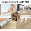A close-up of a rugged Oxford cloth mat showing stain resistance and anti scratch features.