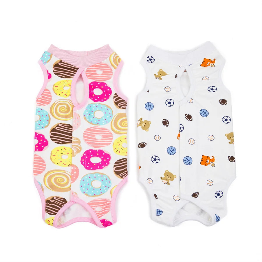 A set of pink and white comfortable recovery vests for cats featuring various colorful patterns and small animal designs.