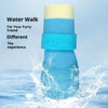 A light blue water walk boot for a dog is shown splashing in clear water.