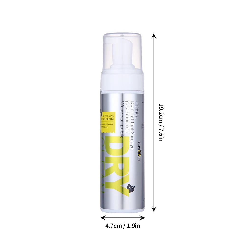 A tall silver bottle of pet paw cleaner foam for cats and dogs with a white pump dispenser.