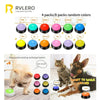 A set of dog and cat training buttons in various colors for pet training.
