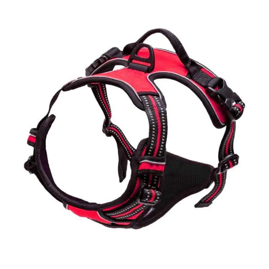 A red and black adjustable no-pull dog harness with reflective strips and a handle.