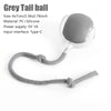 A grey tail ball cat toy featuring a silicone rolling ball and a flexible cord for interaction.