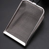 Stainless steel mesh pet poop shovel with a handle, shown in a close-up view.