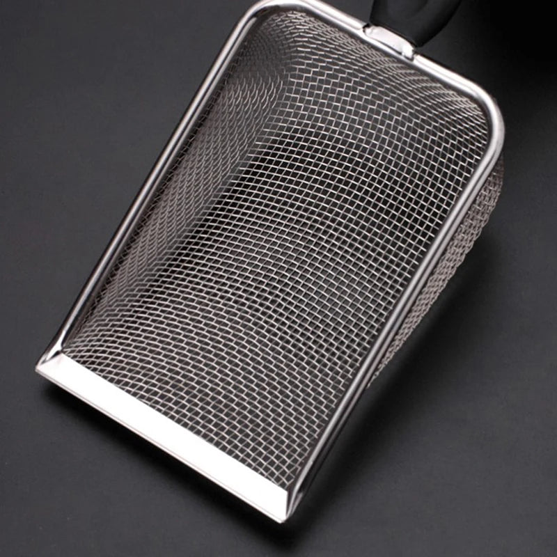 Stainless steel mesh pet poop shovel with a handle, shown in a close-up view.
