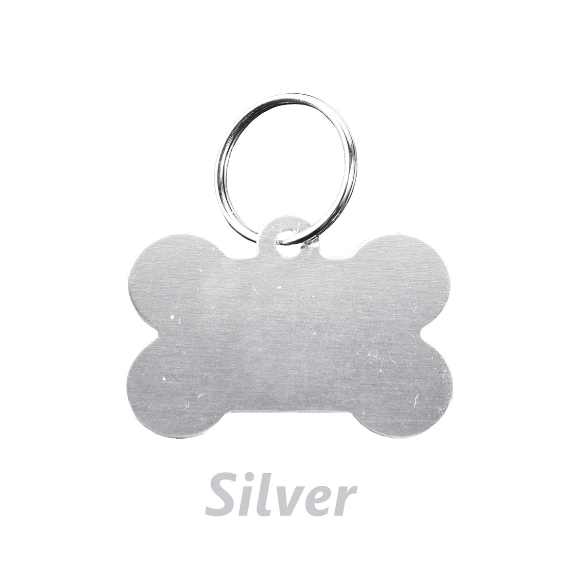 Silver bone-shaped dog ID tag with a circular loop for attachment