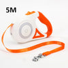 White and orange retractable LED dog leash with a glowing strip shown against a white background.