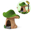 A wooden resin aquarium house decor with a green mushroom-shaped hiding shelter for small fish and shrimp.