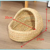 A natural straw woven mat with dimensions 20cm, 19cm, and 27cm shown on a wooden surface.