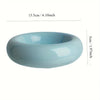 Light blue ceramic donut cat bowl with a smooth, rounded rim and anti-slip base.