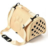 A beige breathable pet carrier bag designed for cats and small dogs, shown from the side.