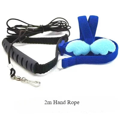 A black adjustable bird training harness and leash set with blue fabric accents and a rope.