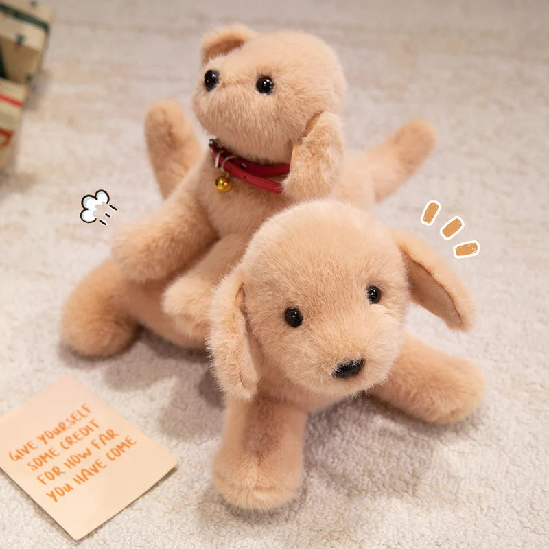 A fluffy golden retriever plush dog toy lying on a light-colored carpet with a credit card visible nearby.