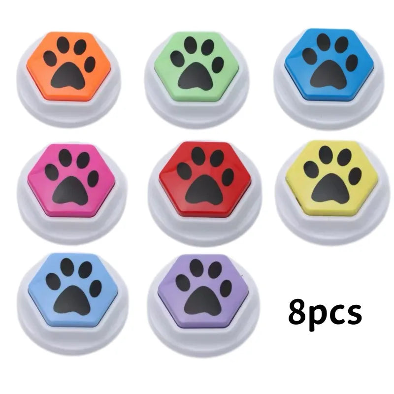 Eight colorful recordable talking buttons for dog training featuring paw print designs.