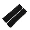 Black plush car seat belt shoulder protector shown diagonally.
