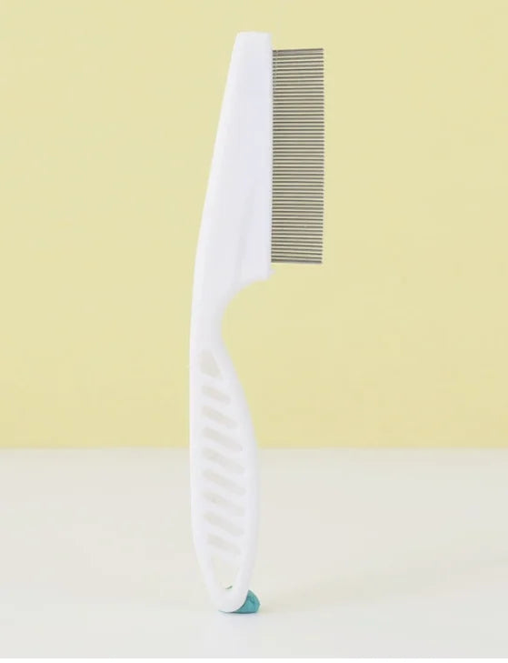 A white one-button pet hair removal brush with a metal comb is shown against a light yellow background.