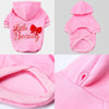 Pink custom letter print dog hoodie featuring the text Little Beauty on the hood and chest.