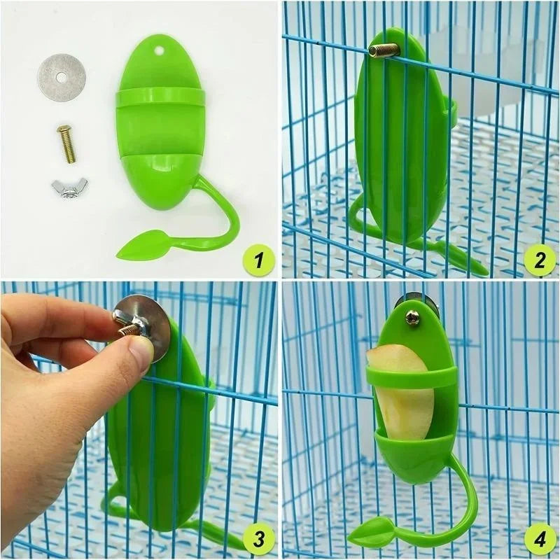 A green bird shuttle feeding stand is shown being used by a hand inside a blue wire cage.