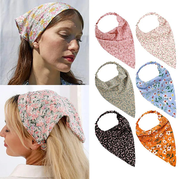 A collection of bohemian paisley triangle head scarves in various floral patterns and colors.