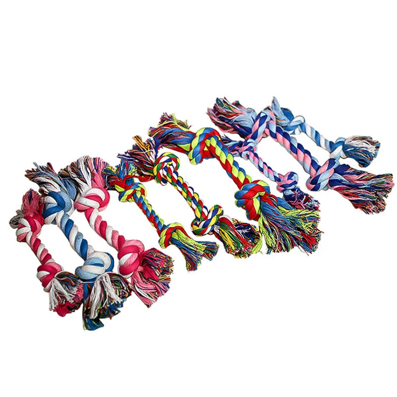 A colorful, braided cotton rope dog chew toy with various shades of blue, pink, and yellow.