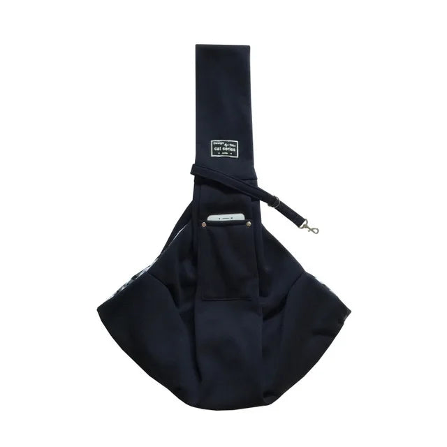 A navy blue pet carrier sling bag designed for dogs and cats.