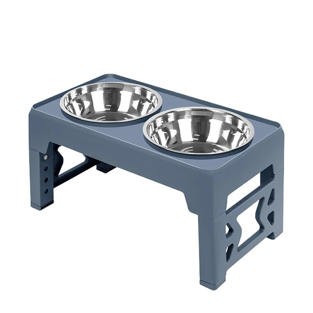 A gray adjustable raised dog feeder with two stainless steel bowls.