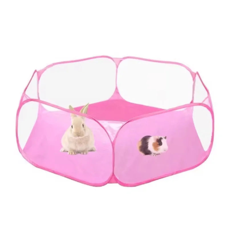A pink portable pet playpen with a rounded enclosure designed for small animals.