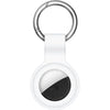 A white silicone protective cover for an AirTag with a metal keychain ring.