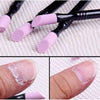 A set of professional nail files and cuticle remover tools with pink tips shown next to a hand applying the product.