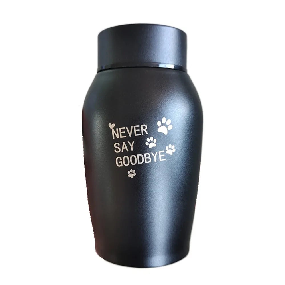 A matte black stainless steel pet memorial storage box with paw prints engraved on the side.