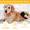 A golden retriever is lying down while a hand uses pet hair remover electrostatic gloves on its fur.
