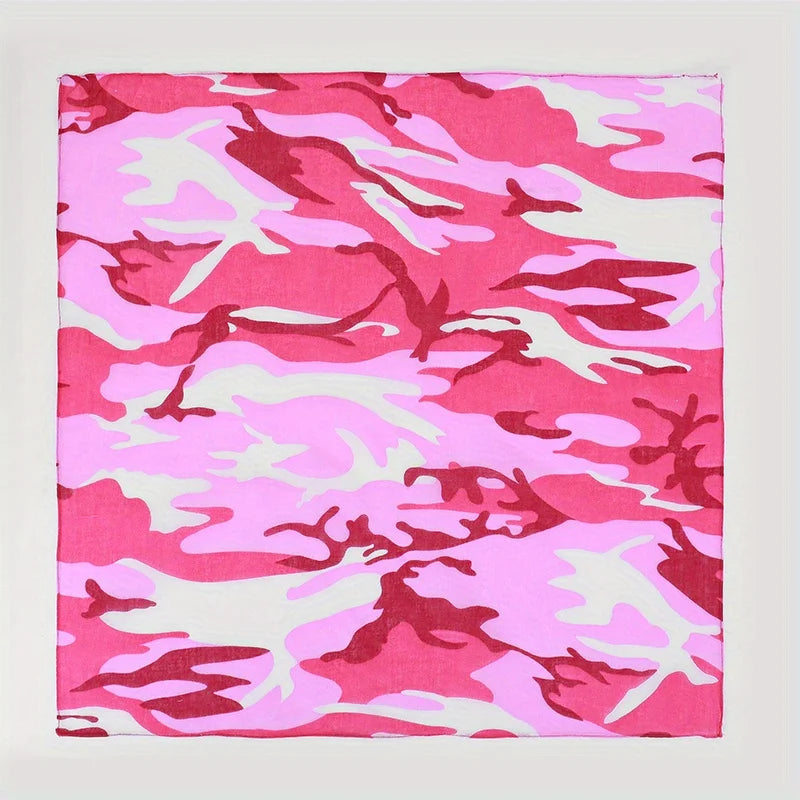 A close-up of a pink and white camouflage print cotton bandana.