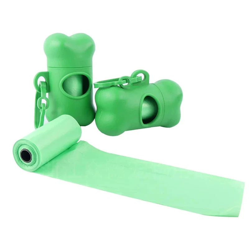 A bright green bone-shaped poop bag dispenser with a clip and a roll of matching bags.