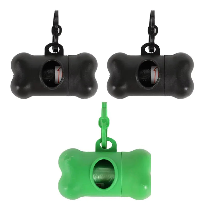 Black bone-shaped poop bag dispenser with clip and a green plastic bag.