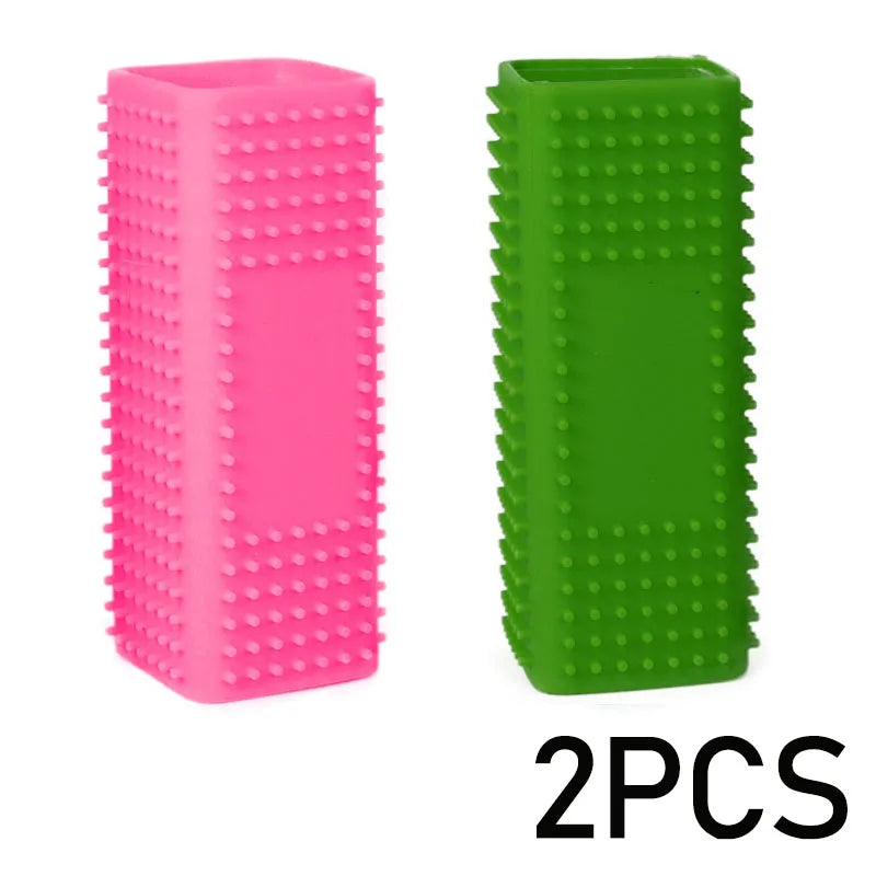 Two silicone pet hair removal brushes, one pink and one green, with rubber bristles.