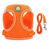 Orange mesh dog harness with reflective strips and an adjustable strap for small pets