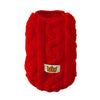 A bright red, fuzzy fleece dog sweater with a gold crown logo on the chest.