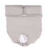 A beige reusable female dog diaper with an adjustable fit and a visible white absorbent pad.