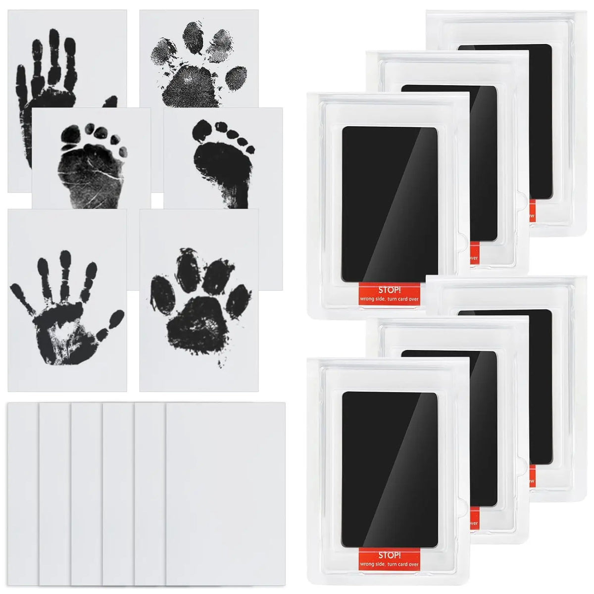Un jeu de quatre cartes d'empreintes de pattes noires dans des cadres blancs et une pile de cartes blanches vierges.