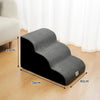 Gray washable non-slip pet stairs used for climbing onto a bed or sofa.