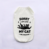 A cream-colored pet vest with black text that reads Sorry I am late My cat was sitting on me.