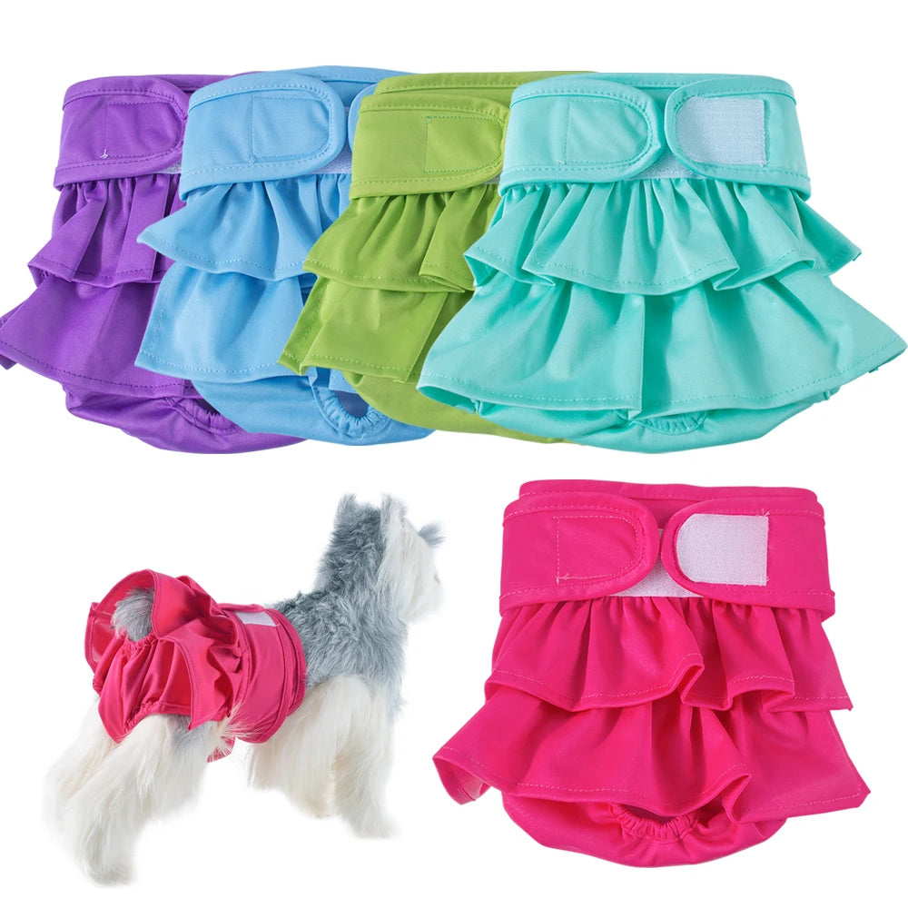 A set of reusable washable dog diapers in purple, blue, green, and pink colors.